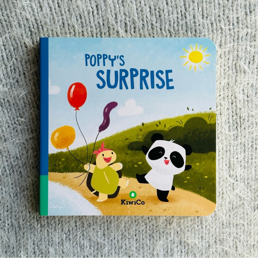 Poppy’s Surprise KiwiCo Baby Board Book